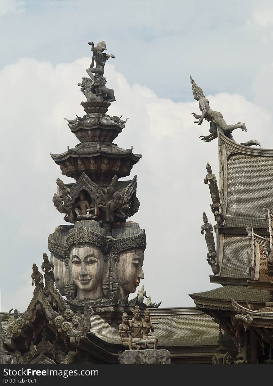 Detail of wooden, Asian temple in Pattaya, Thailand, catering for several Asian religions and philosophies.