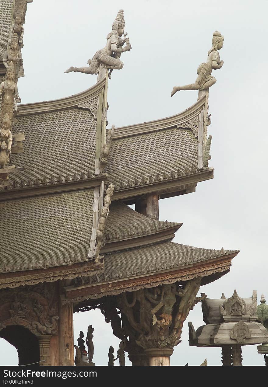 Detail of wooden, Asian temple in Pattaya, Thailand, catering for several Asian religions and philosophies. Detail of wooden, Asian temple in Pattaya, Thailand, catering for several Asian religions and philosophies.