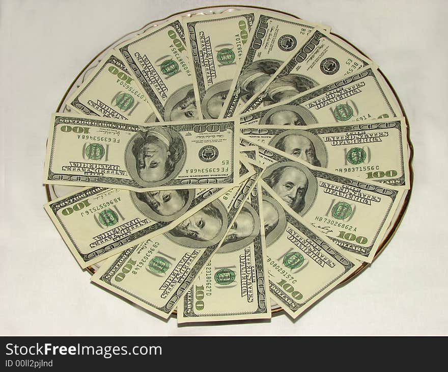 American dollars on the plate. American dollars on the plate