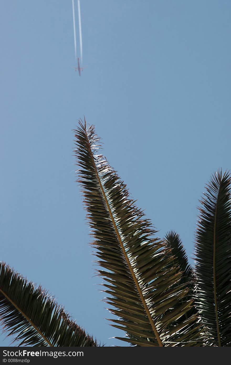 Plane in flight leaving a carbon trail. Plane in flight leaving a carbon trail