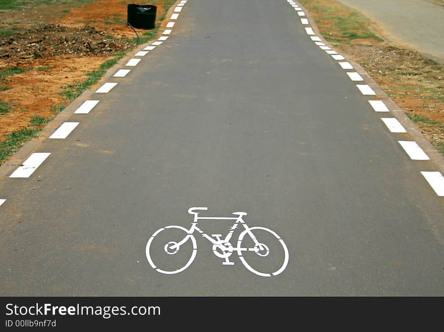 Cyclelane sign on tarmac road