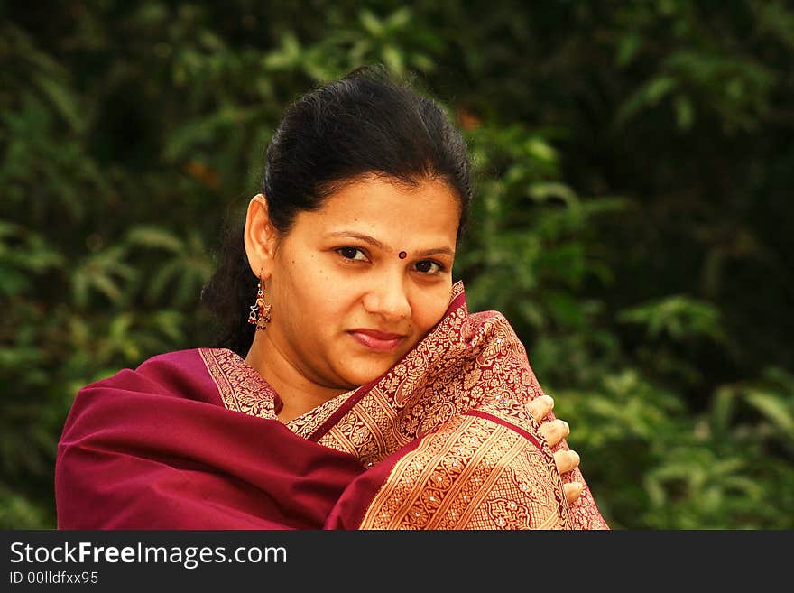 An Indian woman in an intense mood of romance.