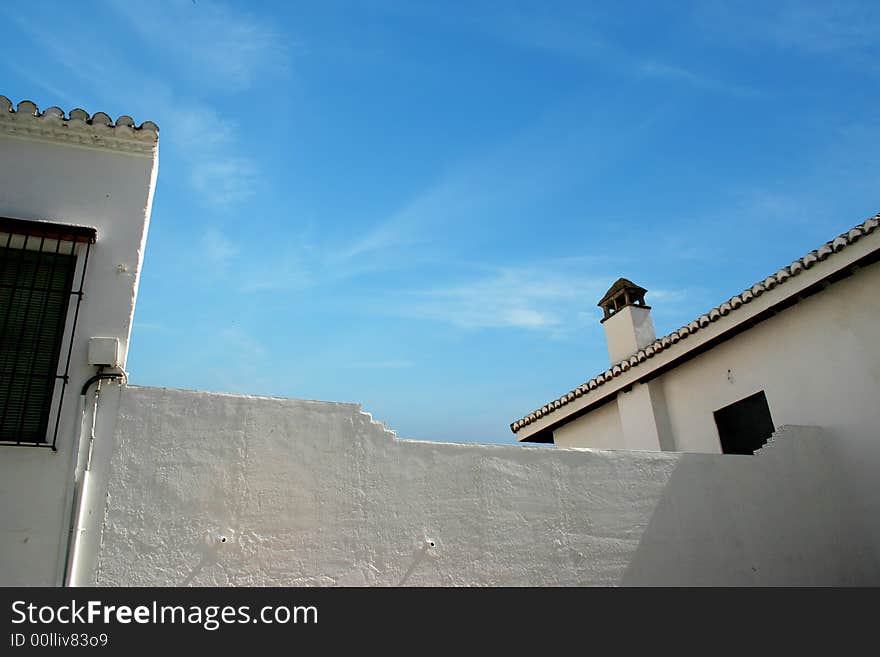 Mediterranean scene with white walls and roofs of Granada in Andalusia. Mediterranean scene with white walls and roofs of Granada in Andalusia