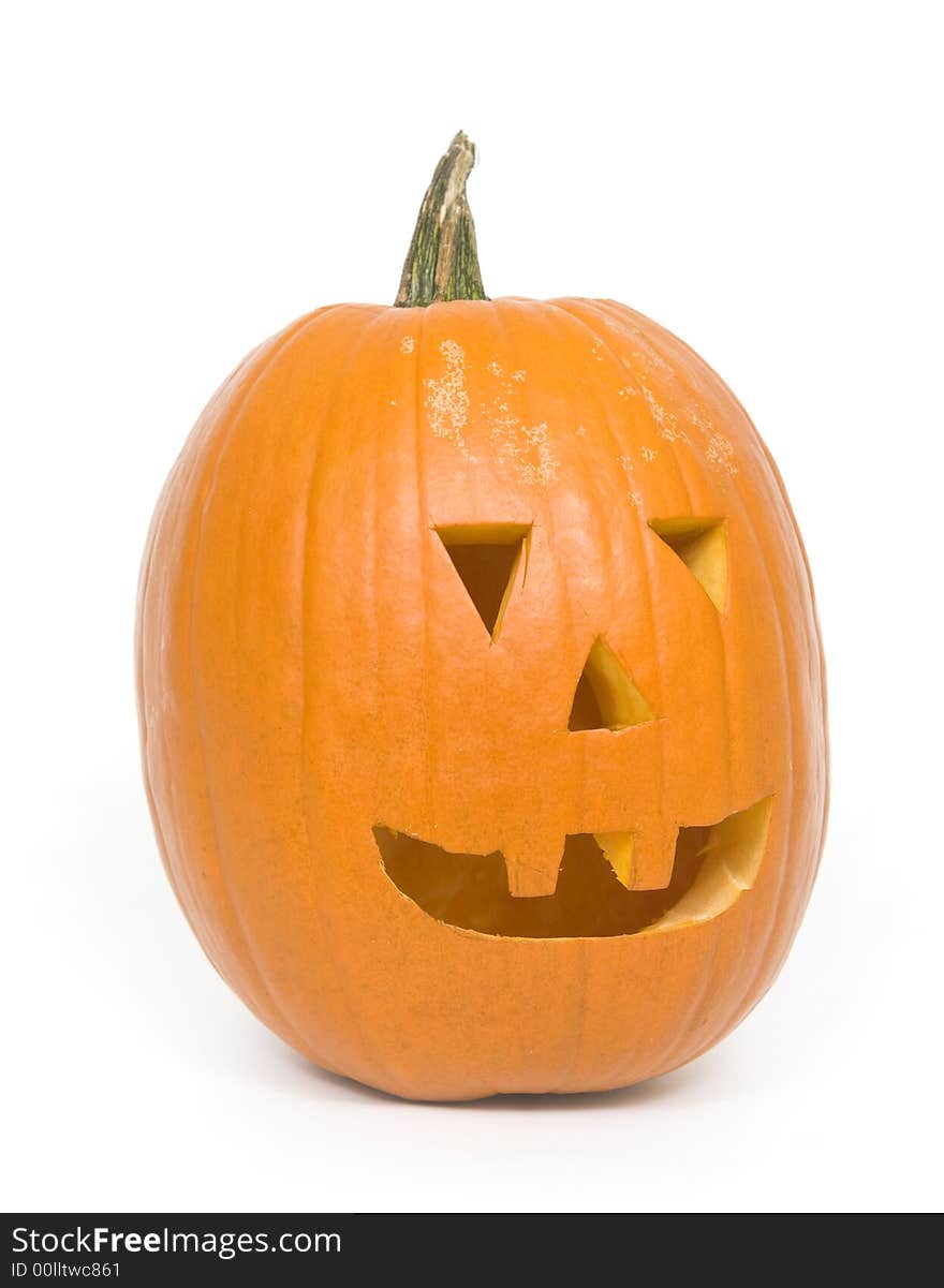 A carved pumpkin for Halloween on white background. A carved pumpkin for Halloween on white background