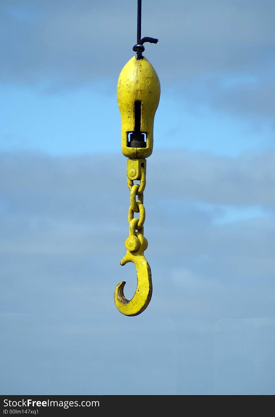 Big yellow hook of a port crane