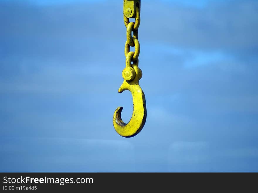 Big yellow hook of a port crane