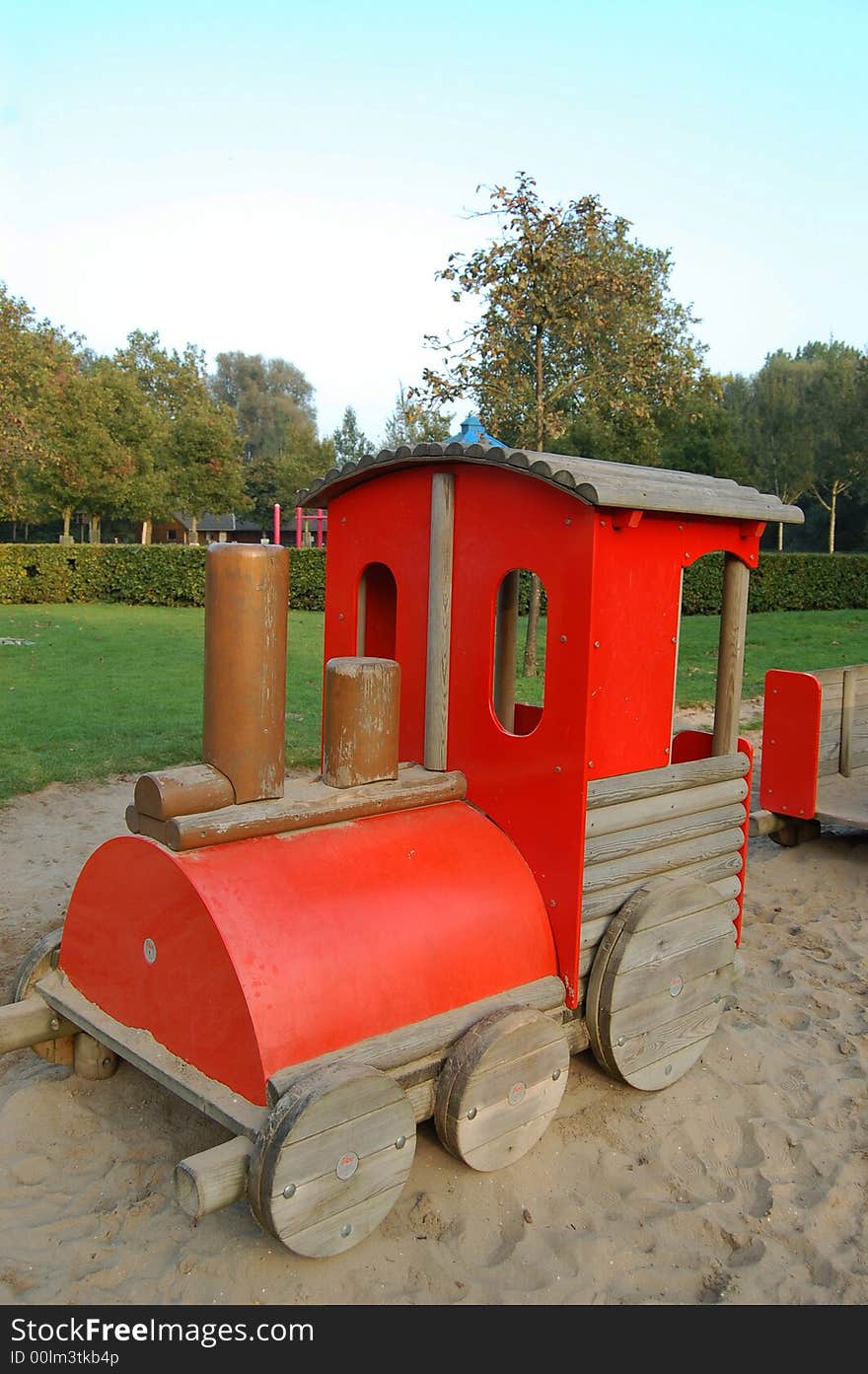 Red train on sand