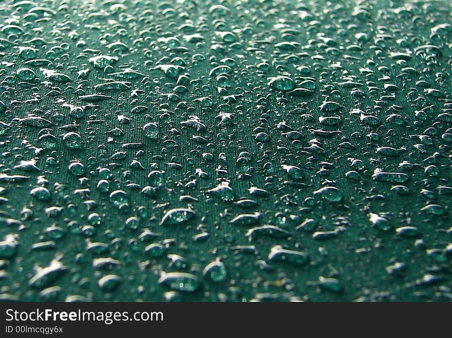 Close-up umbrella with  water drops. Close-up umbrella with  water drops