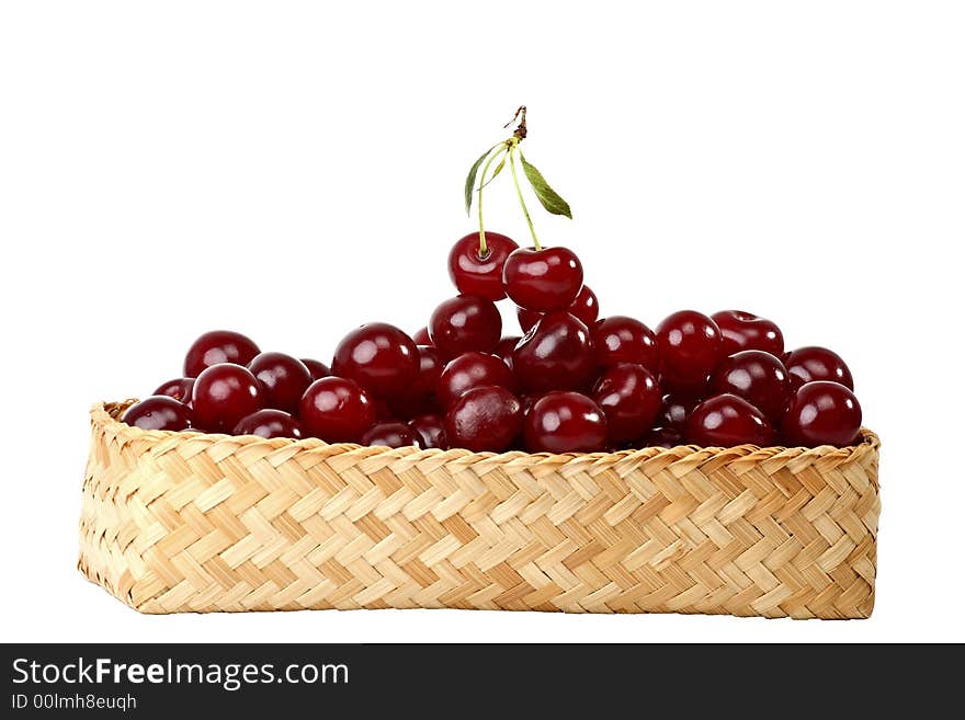 Cherry relations -  cherries in basket isolated on white