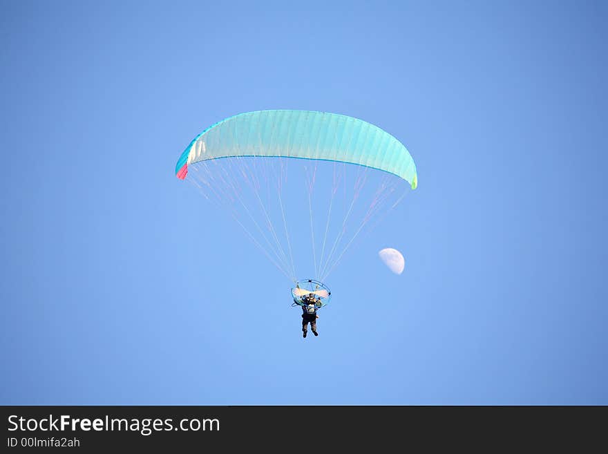 Paraglider and Moon