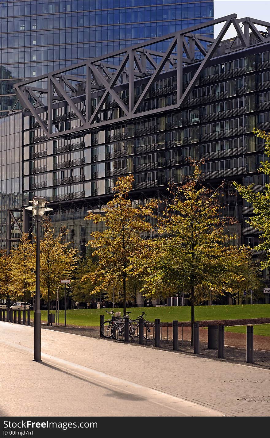 Modern buildings - city landscape with autumn trees