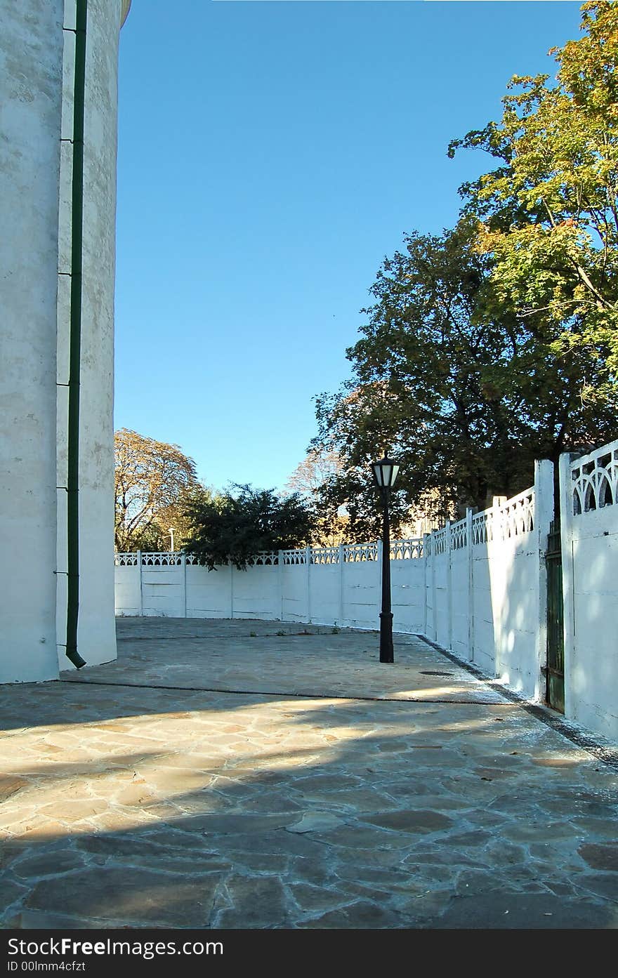 Courtyard with lantern and white wall