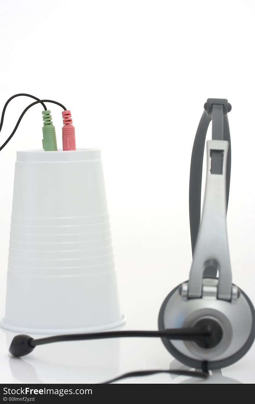 A computer headset over a white background