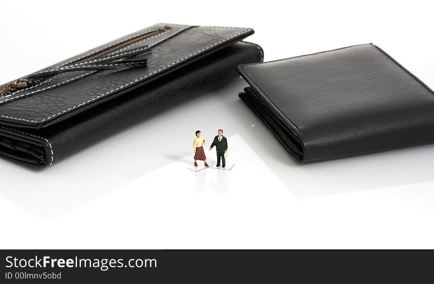 A black leather purse and a black leather wallet. A black leather purse and a black leather wallet