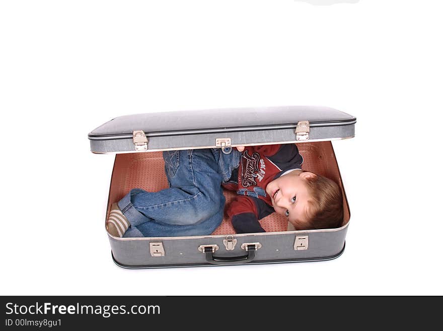 Grey old bag on the white background with boy inside. Grey old bag on the white background with boy inside