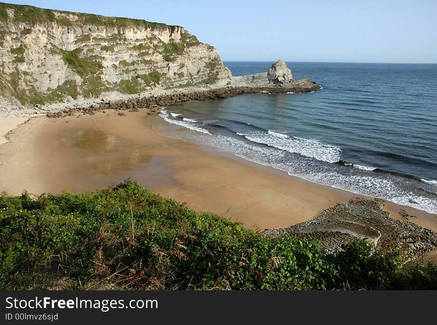 A romantic bay surrounded with a rock and forest. A romantic bay surrounded with a rock and forest