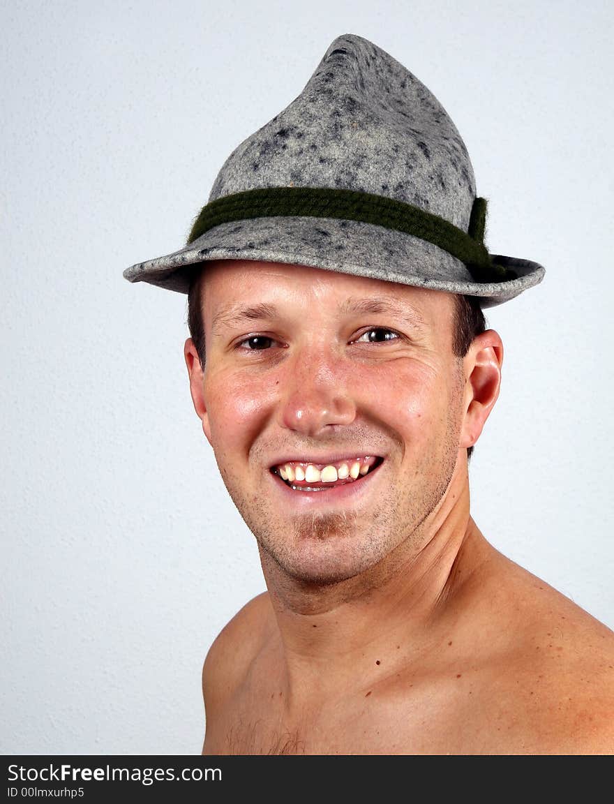 A young farmer with his typical Tyrolean hat. A young farmer with his typical Tyrolean hat.