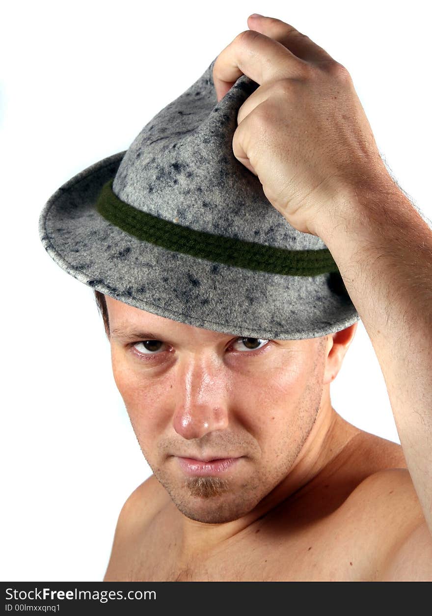 A young farmer with his typical Tyrolean hat. A young farmer with his typical Tyrolean hat.