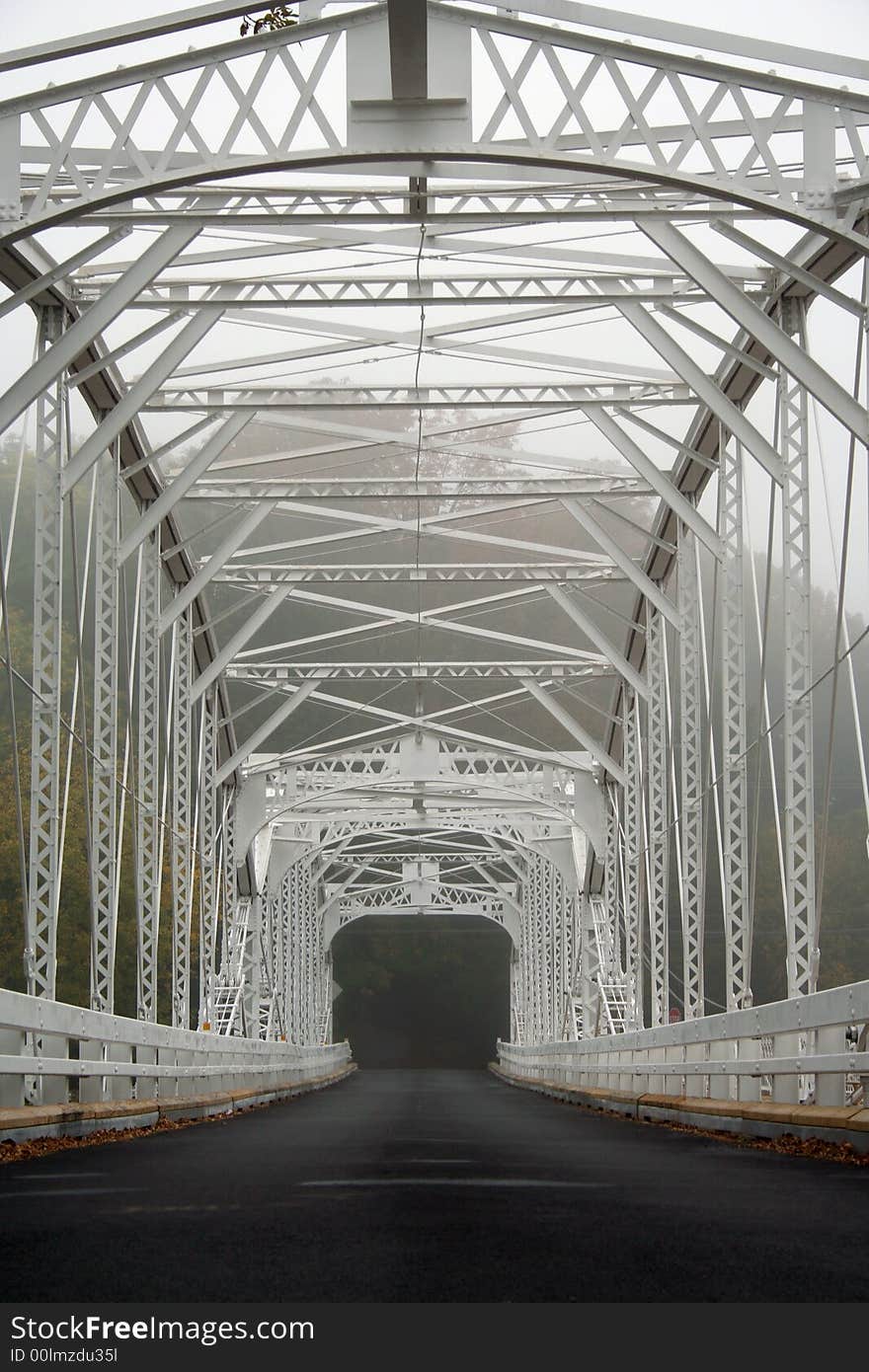 An Old white single lane bridge. An Old white single lane bridge