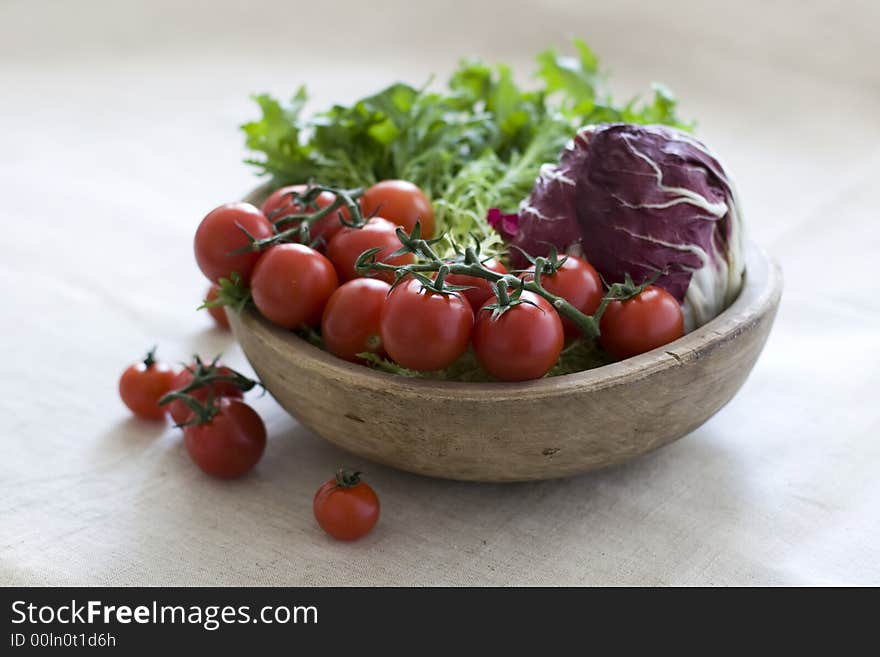 Cherry tomatoes and salad