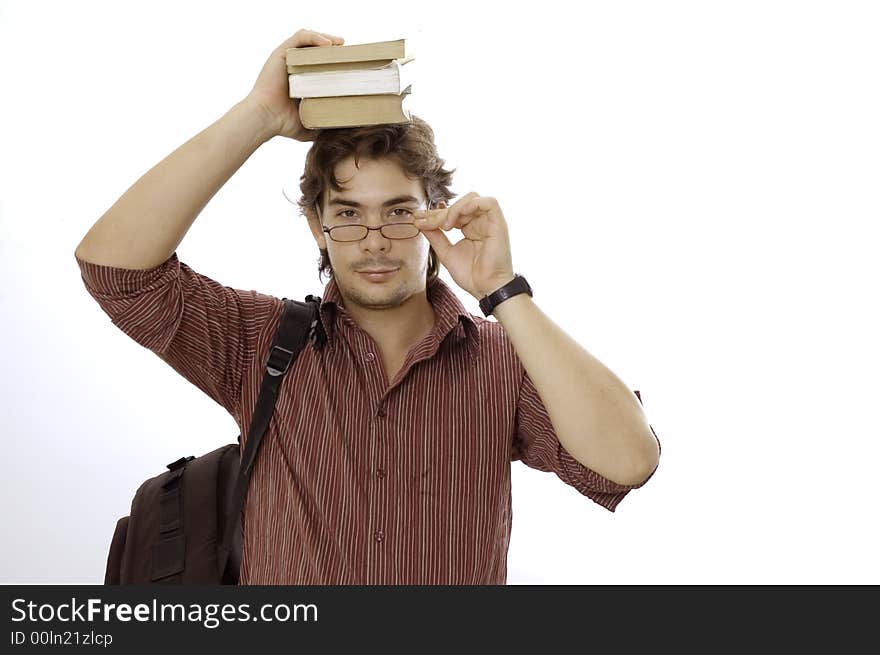 Portrait of a male student holding books and reading glasses - isolated over white background. Portrait of a male student holding books and reading glasses - isolated over white background