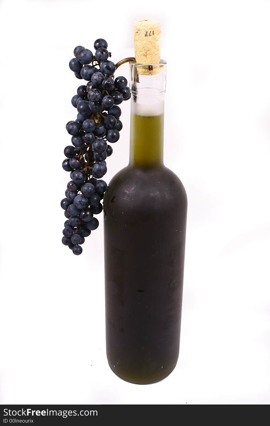 Bottle and grapes isolated on