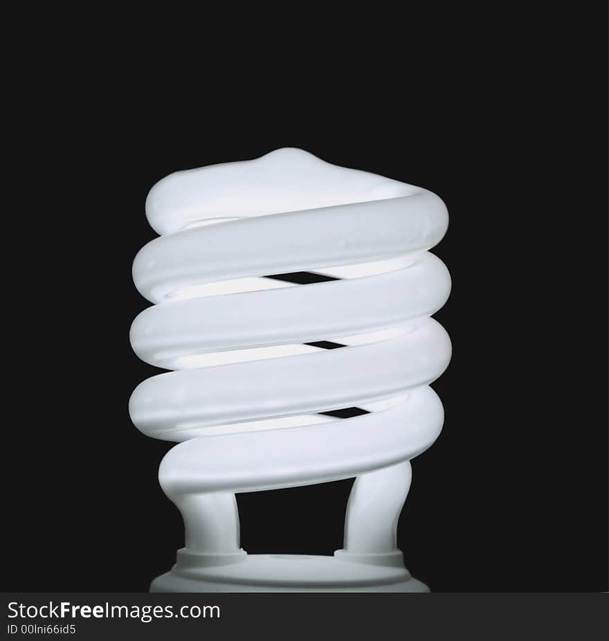 Fluorescent light bulb black background