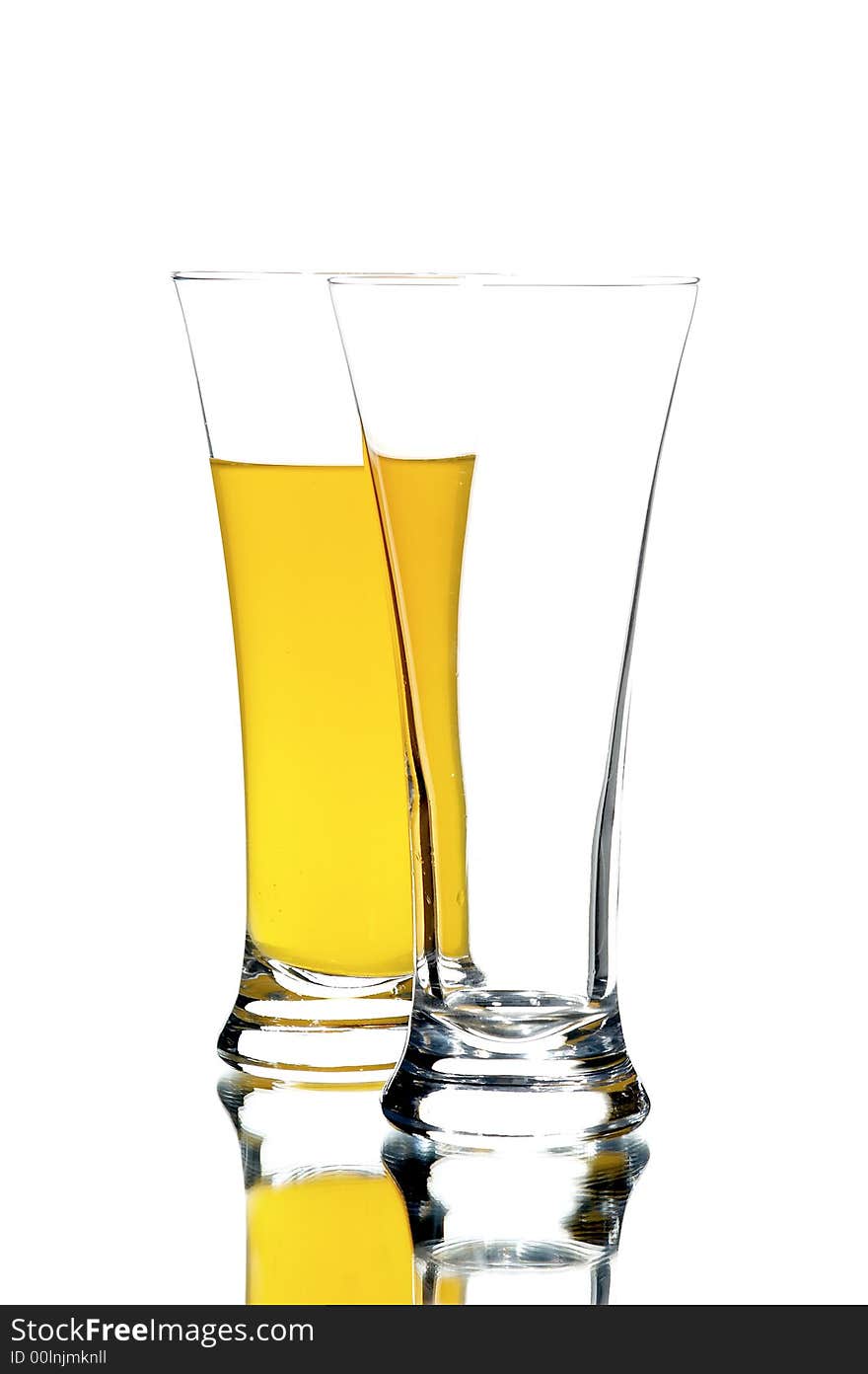 Glasses with juice on the white background