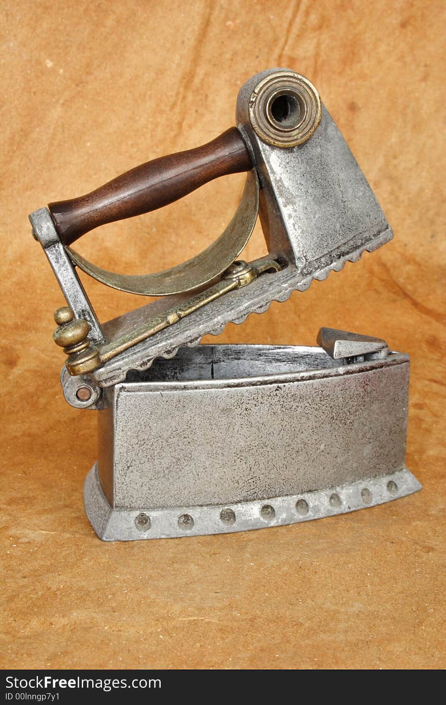 Open old iron with brown background