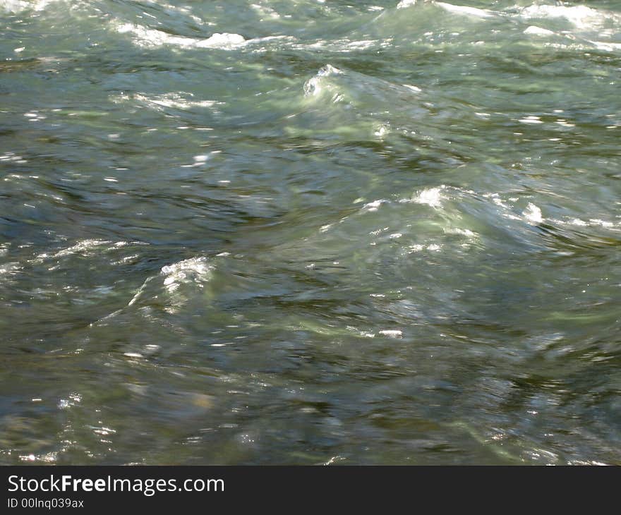 Water with reflection and stones. Water with reflection and stones