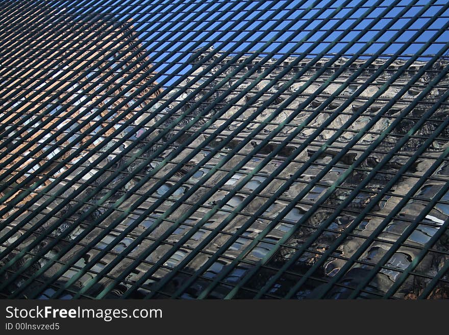 Mirroring of building in skyscraper windows in Chicago. Mirroring of building in skyscraper windows in Chicago