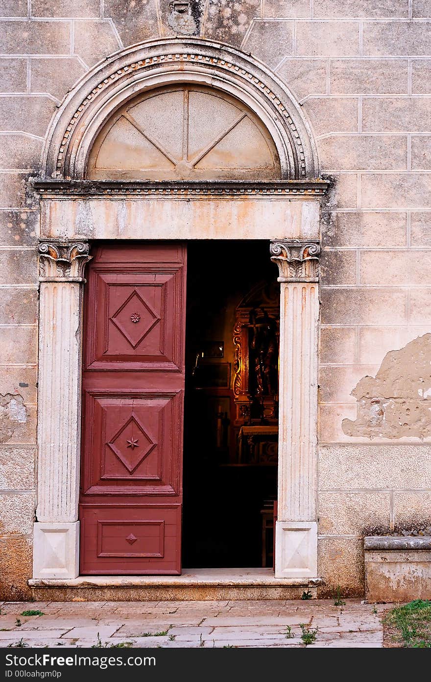 Old church door in a mediterranean city