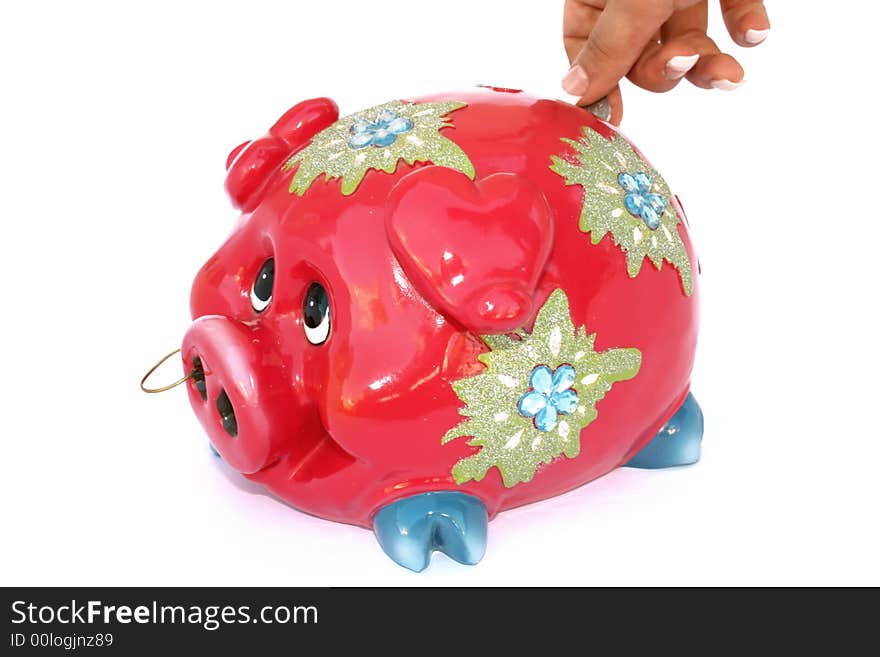 Red piggy bank isolated on the white.