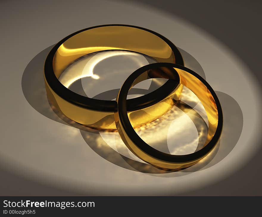 Two Gold Rings on a table top. Two Gold Rings on a table top