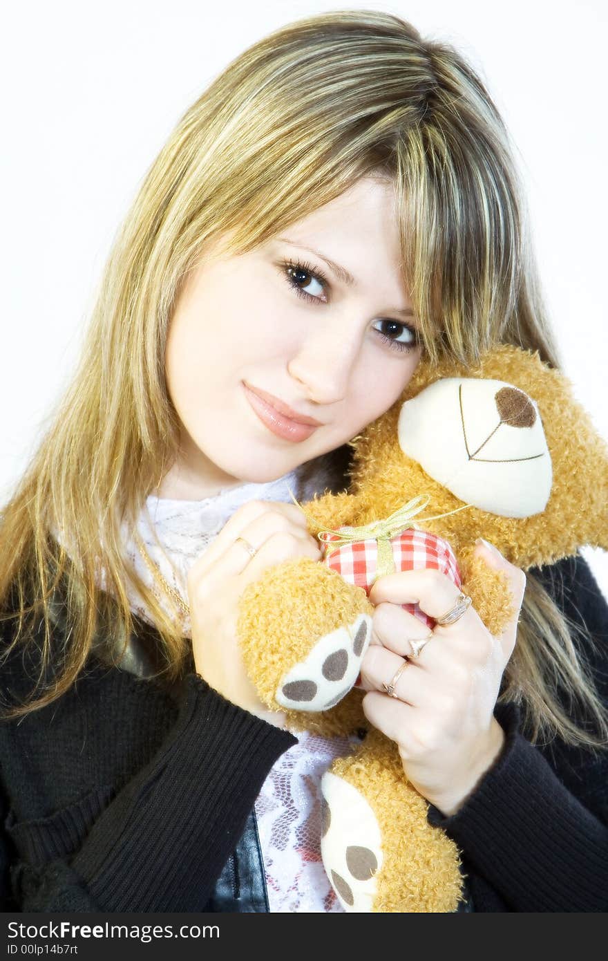 Young girl and yellow teddy. Young girl and yellow teddy