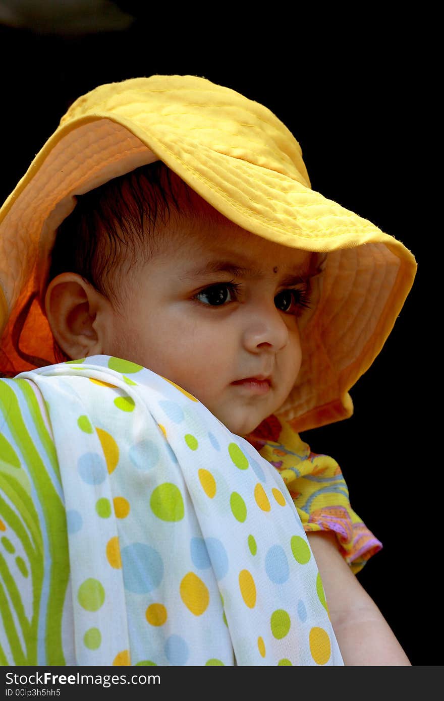 A baby observing something with rapt attention. A baby observing something with rapt attention.