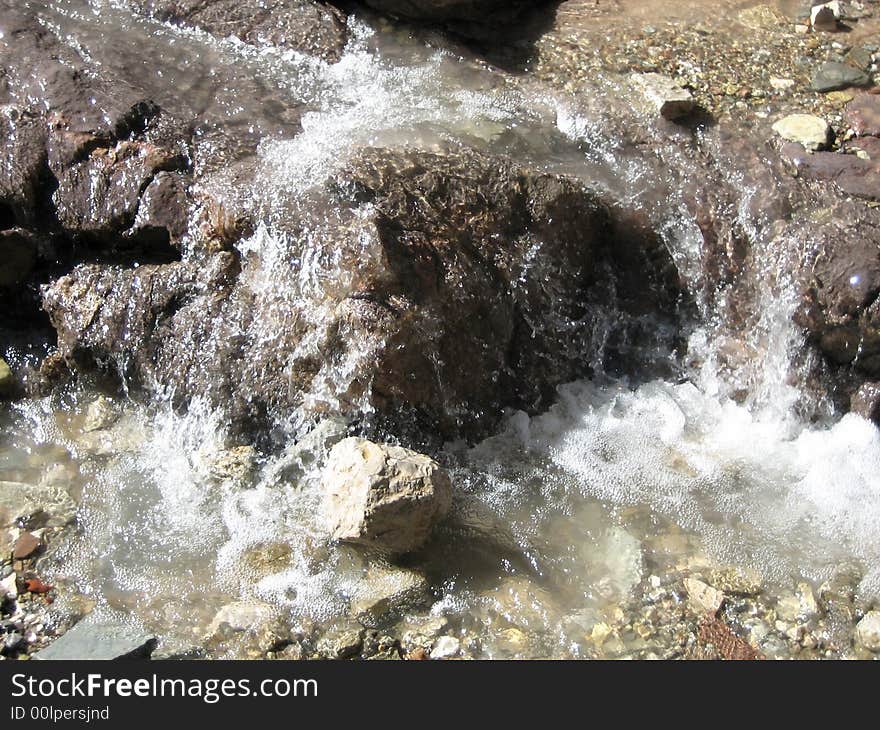 Water with reflection and stones. Water with reflection and stones