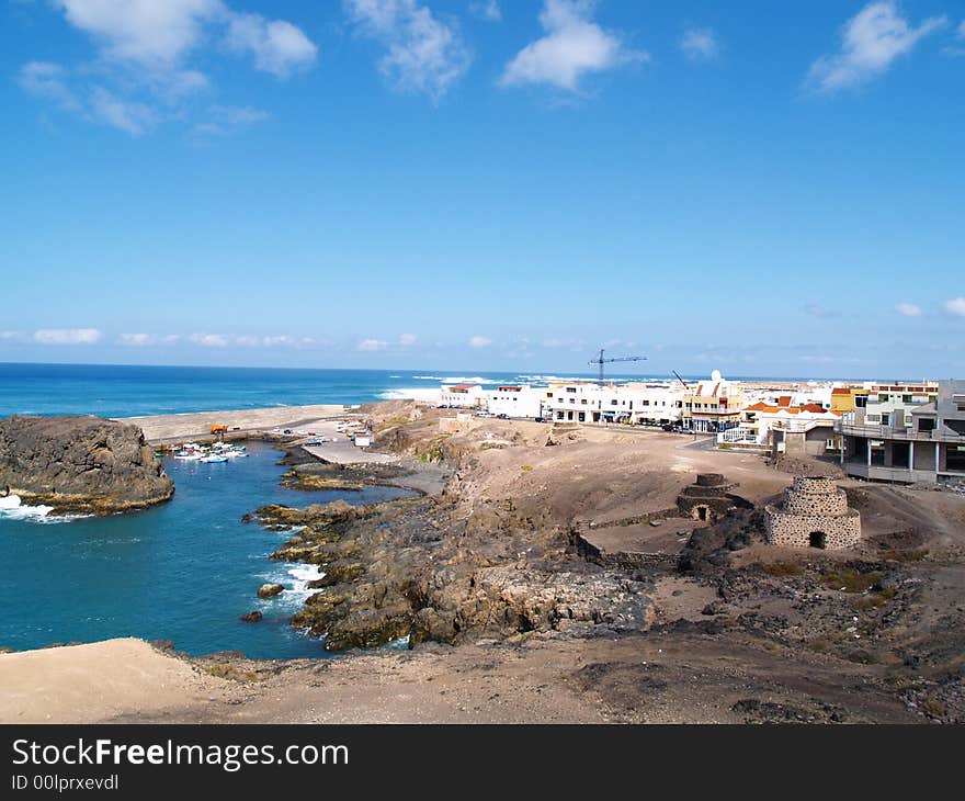 A port and the city of El Cotillo 
fuerte ventura Spain