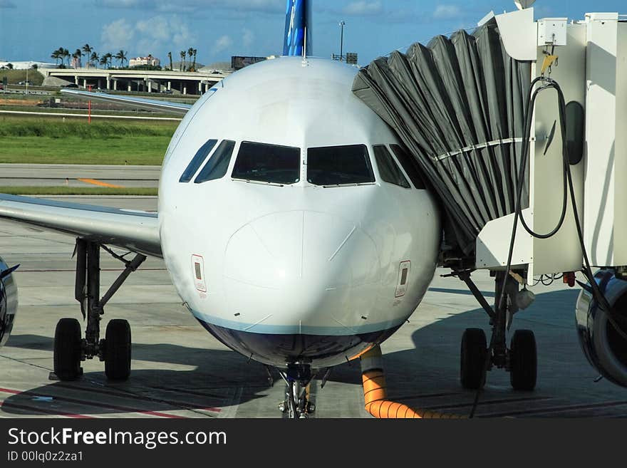 Airliner parked ready for boarding. Airliner parked ready for boarding