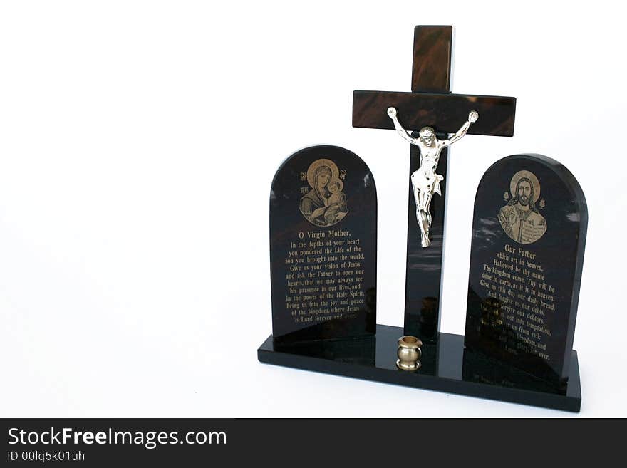 Cross with Jesus and prayers isolated on the white.