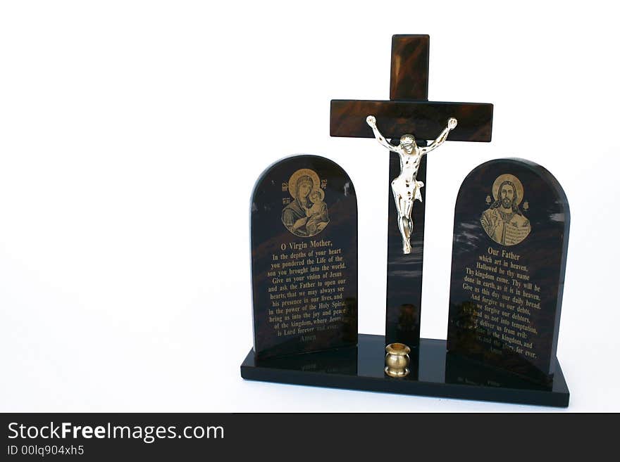 Cross with Jesus and prayers isolated on the white.