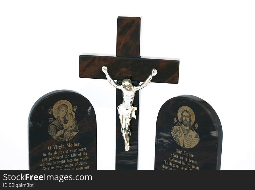 Cross with Jesus and prayers isolated on the white.