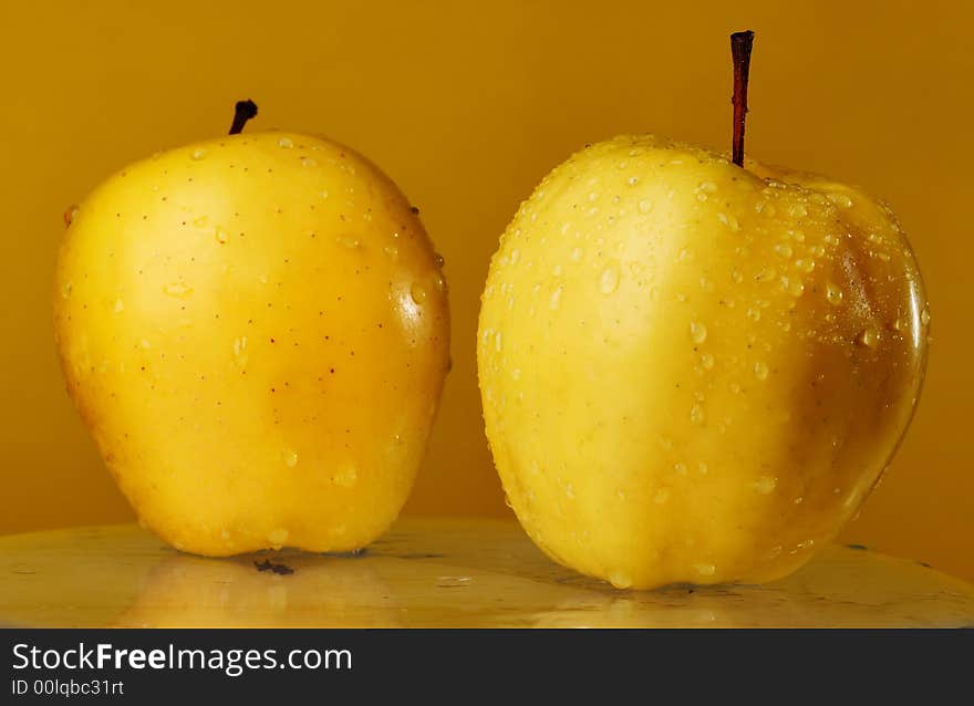 Two yellow apples