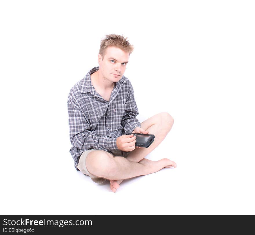 Young man with palmtop on the white background. Young man with palmtop on the white background