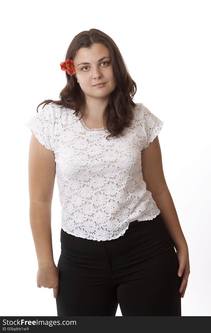 Portrait of a young woman isolated on white with flower