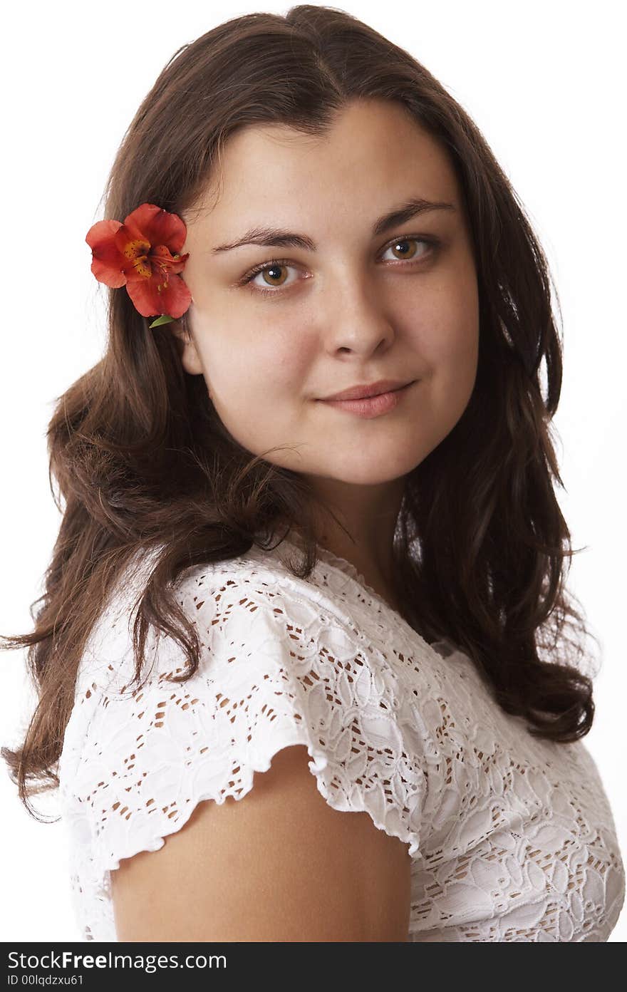 Portrait of a young woman isolated on white with flower