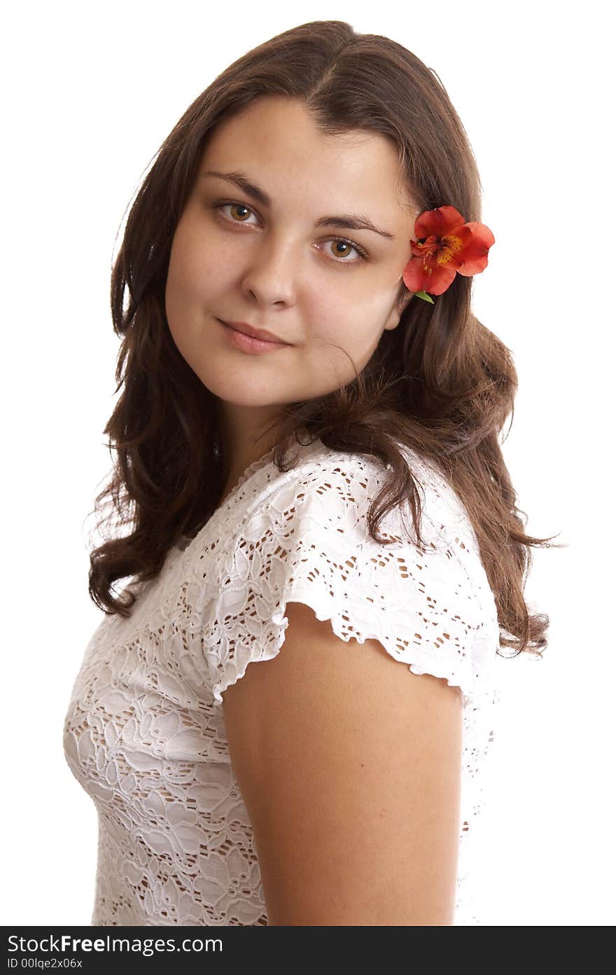 Portrait of a young woman isolated on white with flower