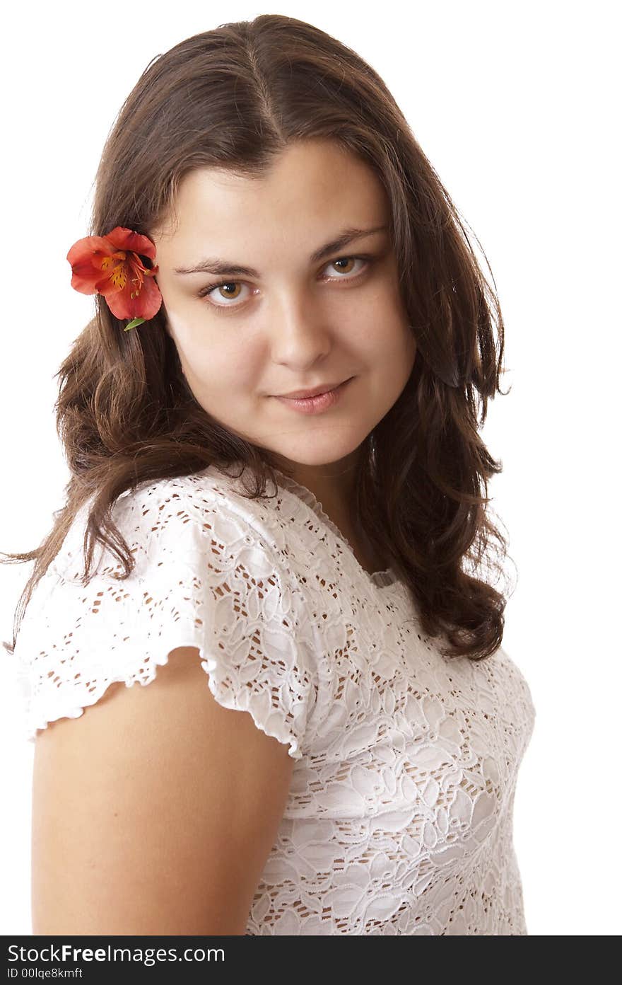 Portrait of a young woman isolated on white with flower