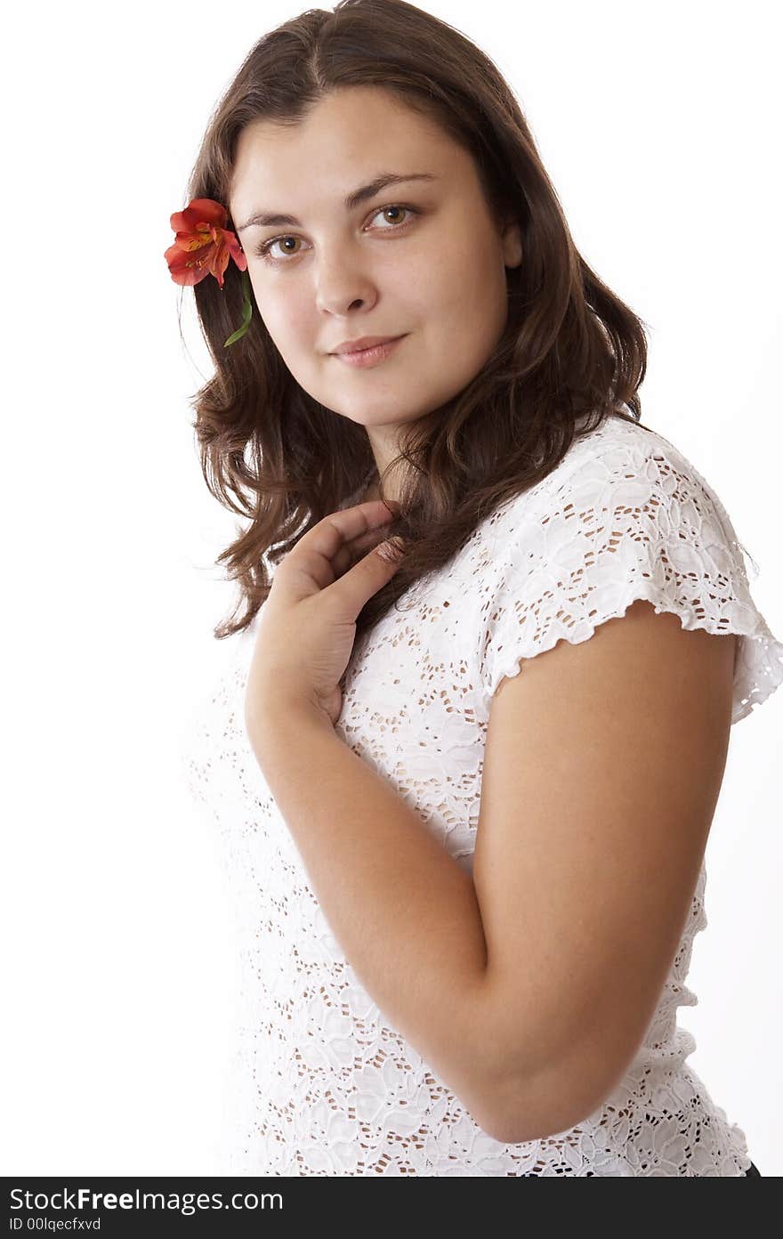 Portrait of a young woman isolated on white with flower