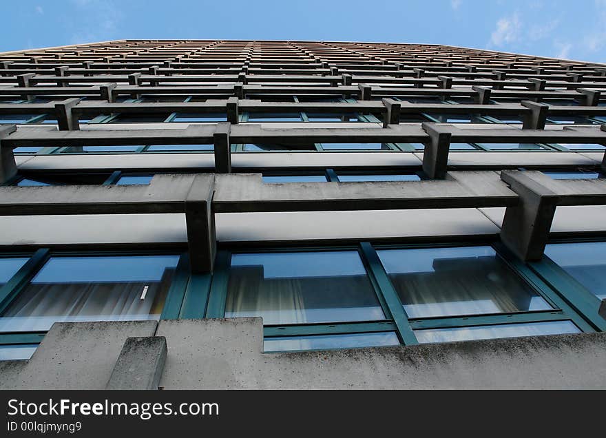 Modern Building of Student Campus in Minich.
Sight from the bottom to top from the point not so far from the wall . Munich , Sommer 2007 .